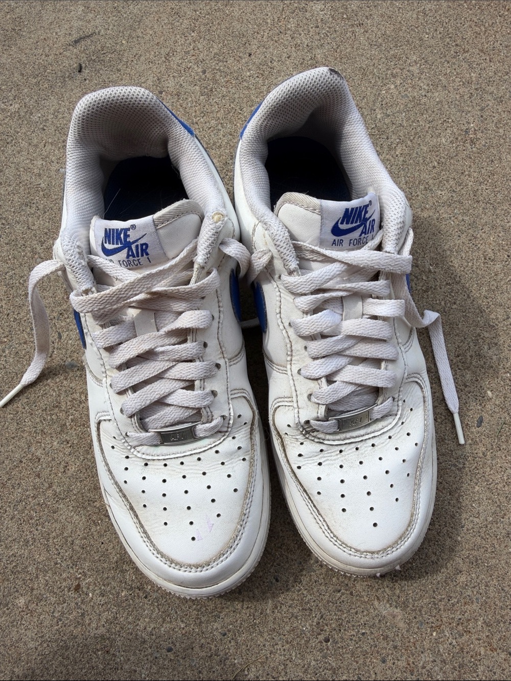 Nike White Sneakers with Blue Accents - Low Top